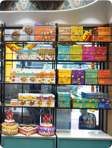 Gifting box with a mix of traditional sweets and namkeen snacks